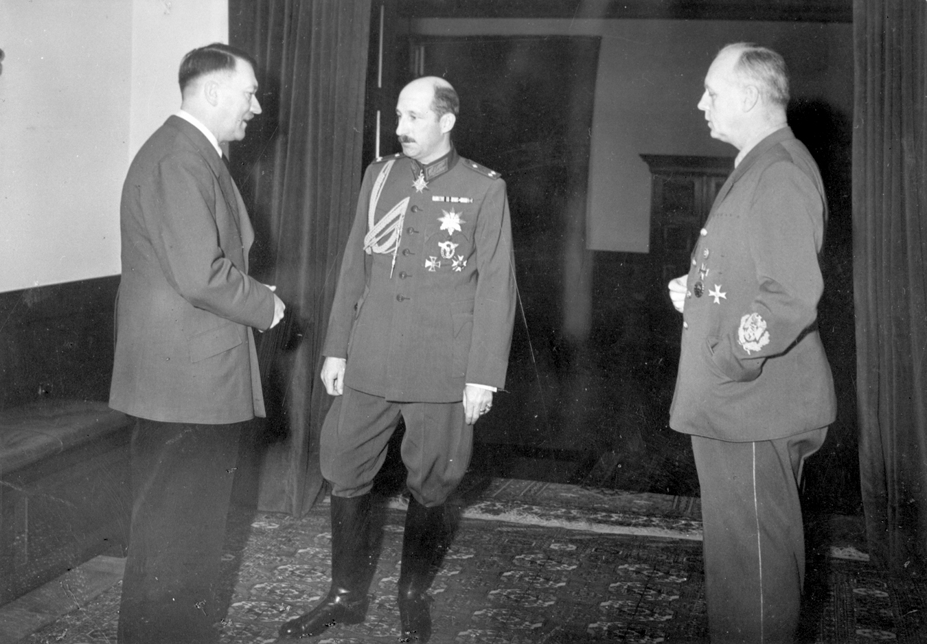 Adolf Hitler in conversation with Zar Boris III and Joachim von Ribbentrop in the great hall of the Berghof, from Eva Braun's albums